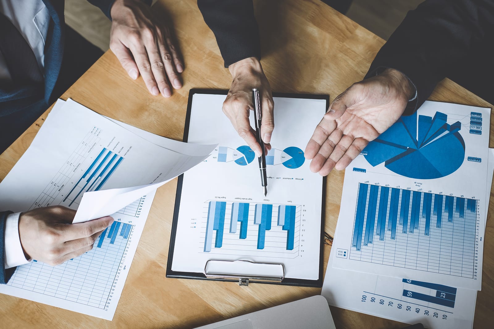 Co working conference, Business team colleagues discussing working analysis with financial data and marketing growth report graph in team, Business finances and accounting concept.